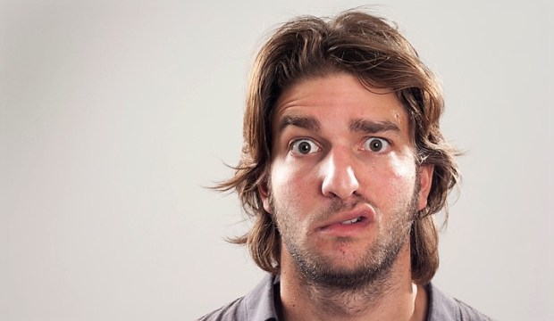 Close up of a man with puzzled look on his face